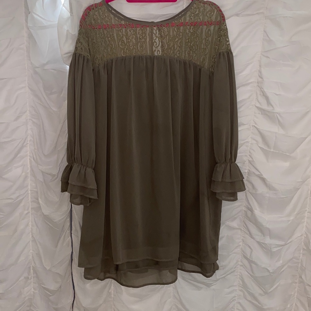 Olive green dress with a delicate lace neckline